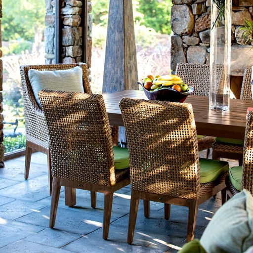 PENINSULA ARM CHAIR IN RAFFIA AND SANDALWOOD FINISH